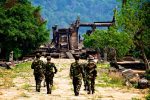 Cambodian soldiers pass through Prasat Preah Vihear.