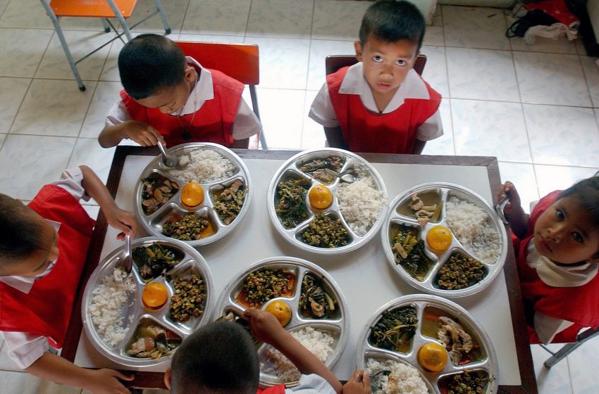 Children from a school in Korat eating