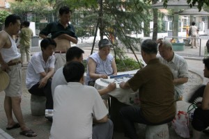 Chinese people playing Mahjong