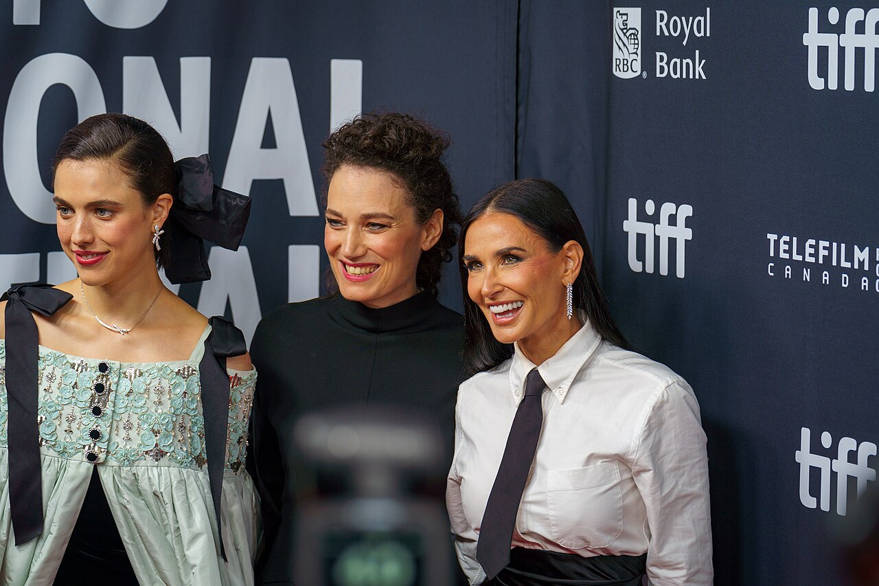 Demi Moore, Margaret Qualley, and Coralie Fargeat at the 2024 Toronto International Film Festival.