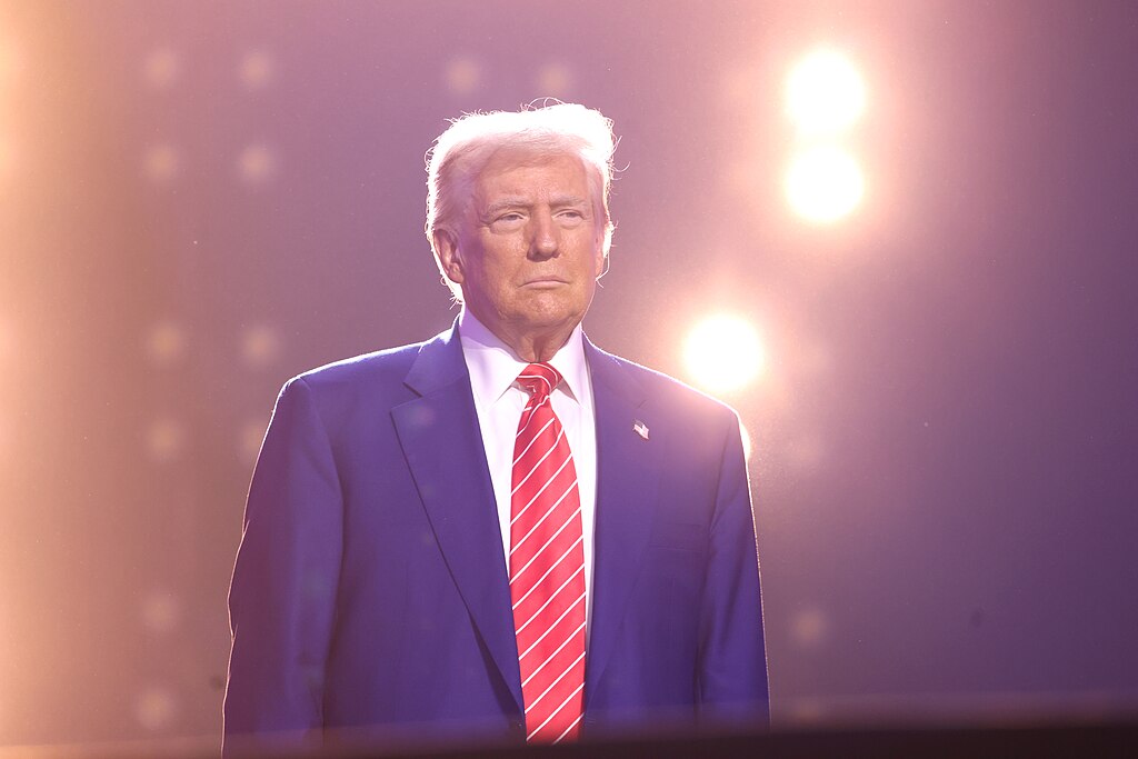 President-elect of the United States Donald Trump speaking with attendees at the 2024 AmericaFest at the Phoenix Convention Center in Phoenix, Arizona.