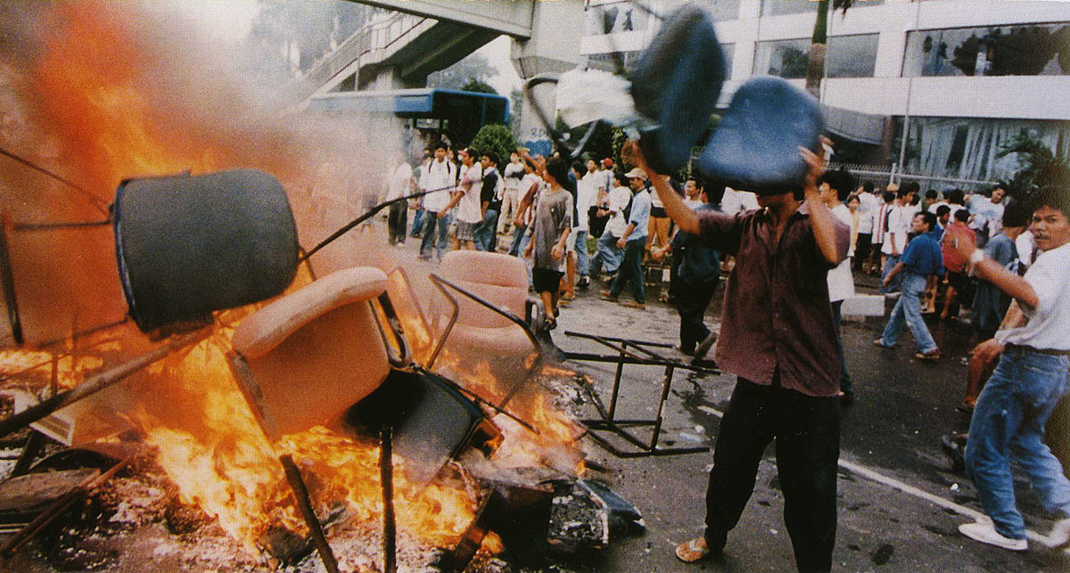 Shops looted and goods burned on the streets in Jakarta, Indonesia on 14 May