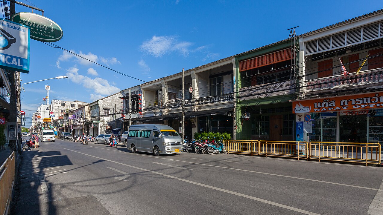 Minivans and motorcycles on Ratsada Road, Phuket.