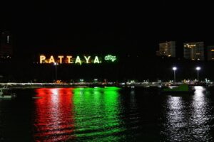 Pattaya city sign at Bali Hai pier at night.