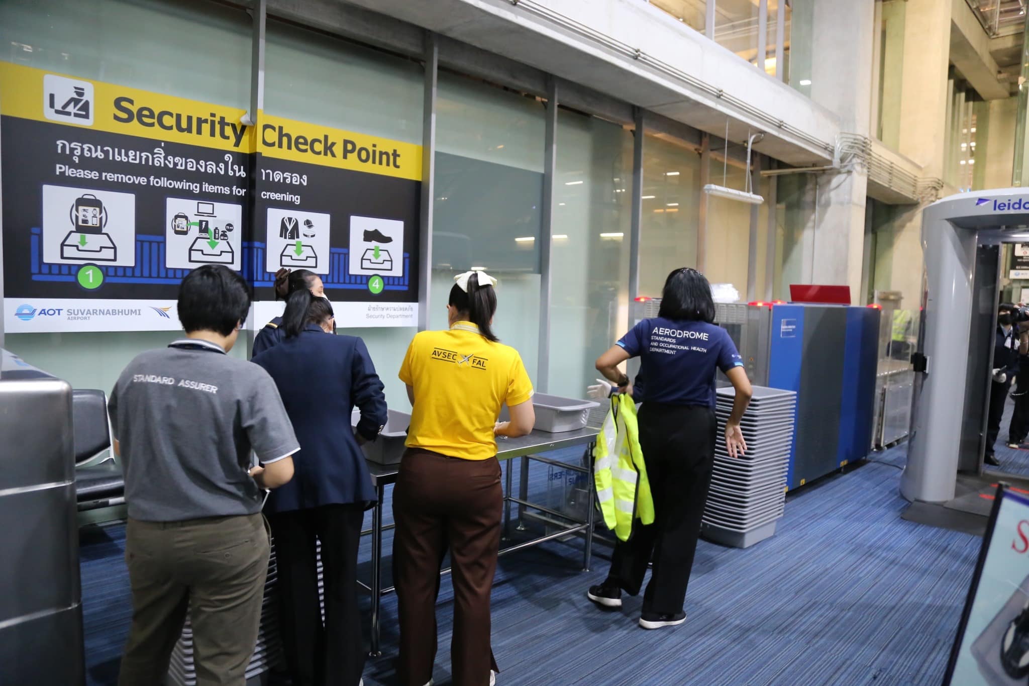 Security check point at Suvarnabhumi Airport SAT-1 terminal in Bangkok.