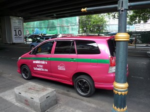 Pink taxi on Sukhumvit Road Bangkok