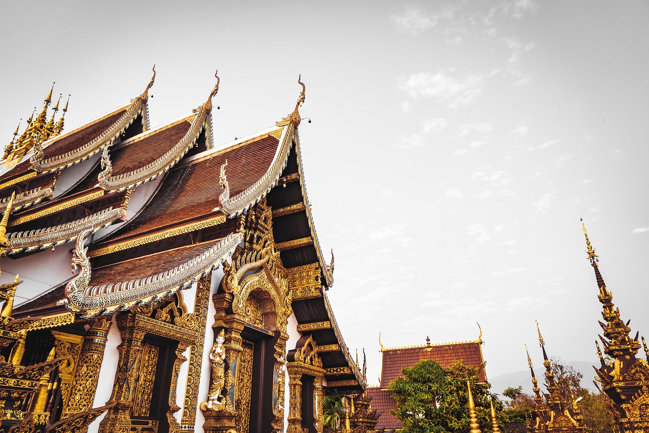 Buddhist Thai temple with ornate roof.