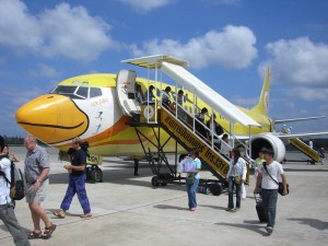 Passengers disembarking a Nok Air flight