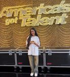 Rattikarn Amloy, known by the stage name Nene Royal, posing at the America's Got Talent stage.