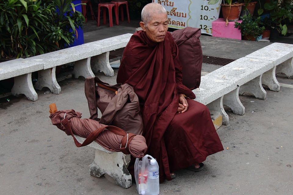 Buddhist Monk sitting down