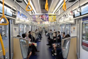 The interior of a Tokyo Metro 13000 series EMU at Naka-Meguro Station on a service to Kita-Senju.