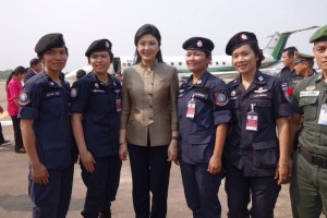 Ex-premier Yingluck Shinawatra poses for pictures with military women