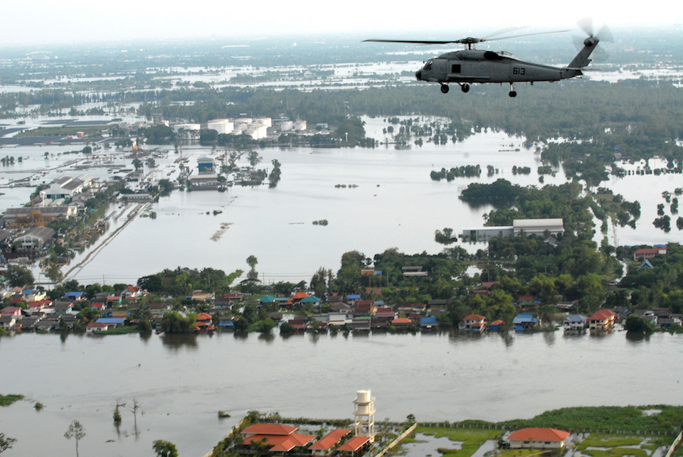 Helicopter flies over flood hit Bangkok