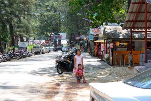 Girl posing on a road in Phuket